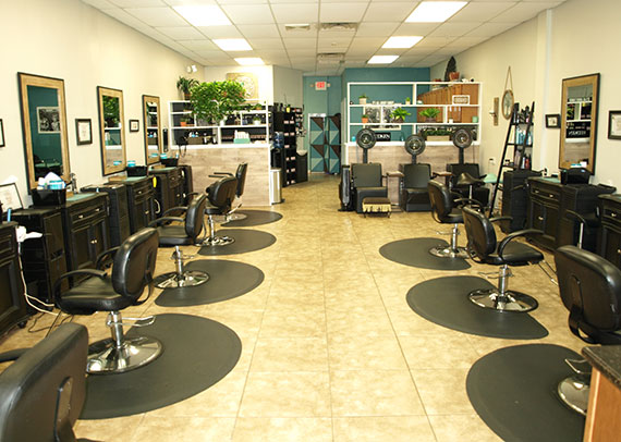 full view of interior and hair stylist stations