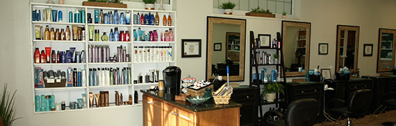 front left of interior products, coffee station, and stylist chairs